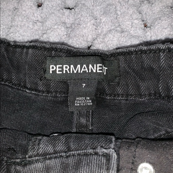 Black distressed jean shorts with holes. - Picture 3 of 3